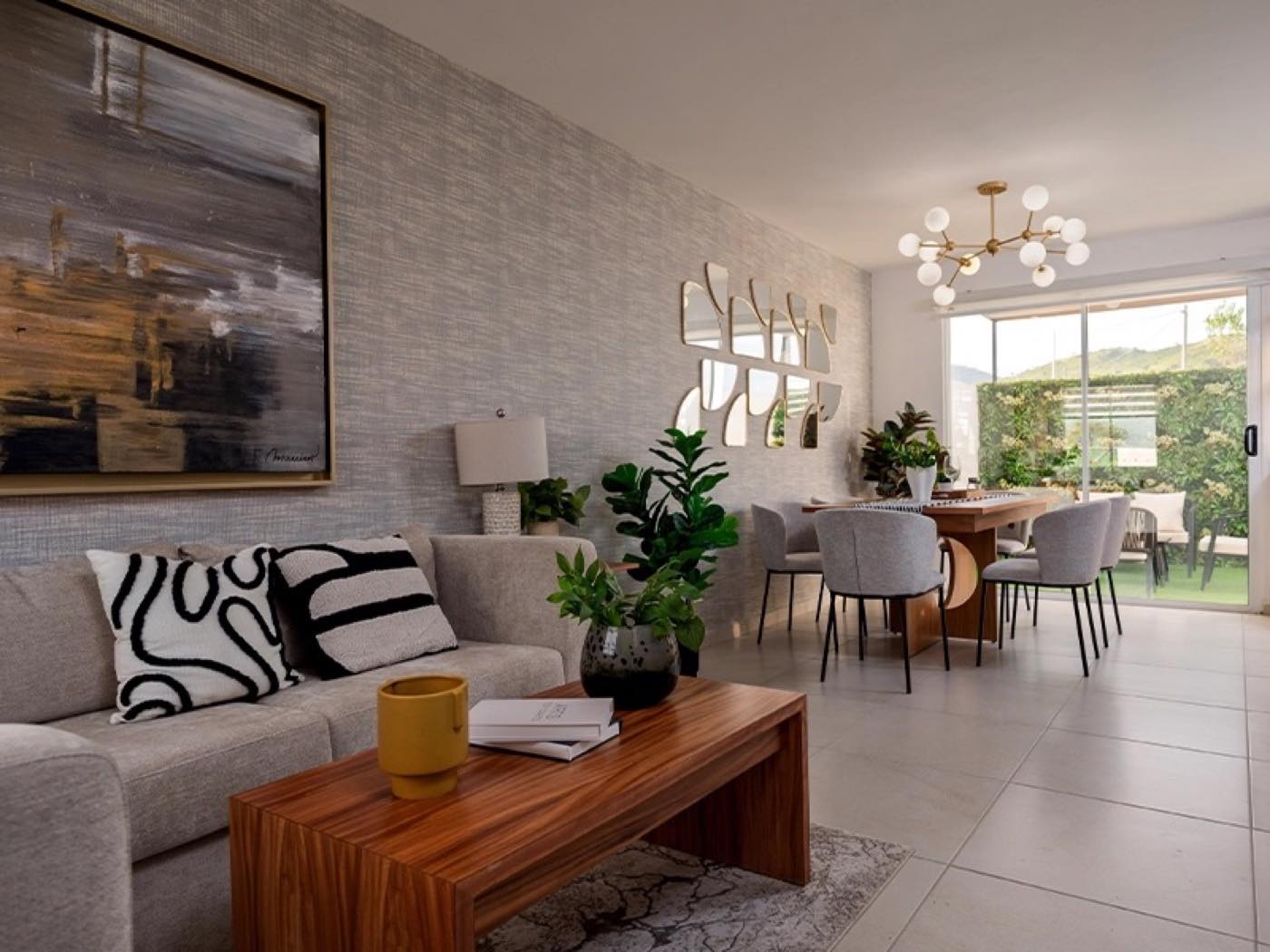 Sala con comedor del modelo Águila fraccionamiento Mirador de los encinos